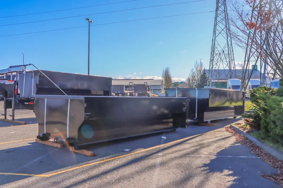 Roll-off dumpster ready for waste disposal at job site for Commercial Dumpster Rental in Kings Grant